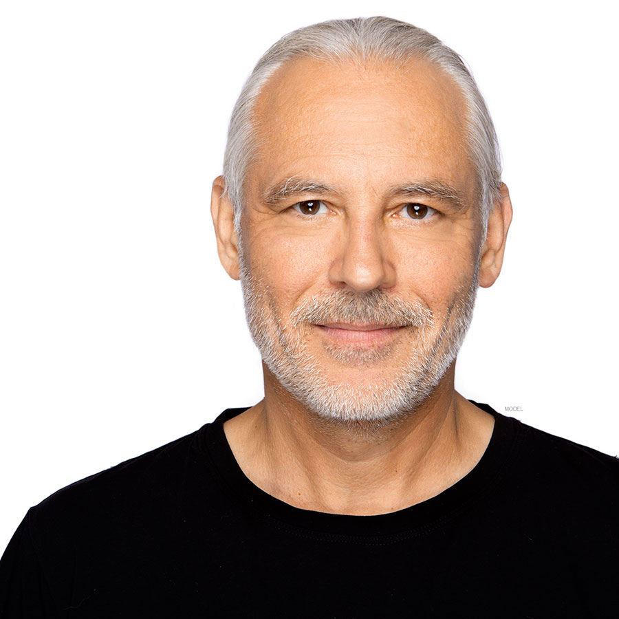 Man smiling wearing black shirt